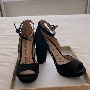 Black American Rag high heels with ankle straps.